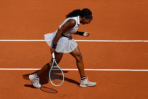 Coco Gauff celebrates after scoring a point 
